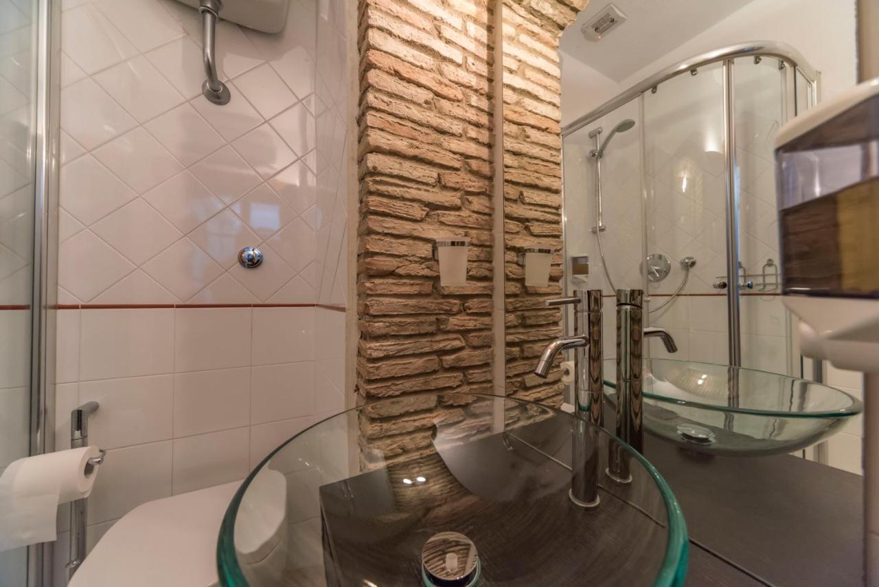 Relais Del Porto Hotel กาญารี ภายนอก รูปภาพ
