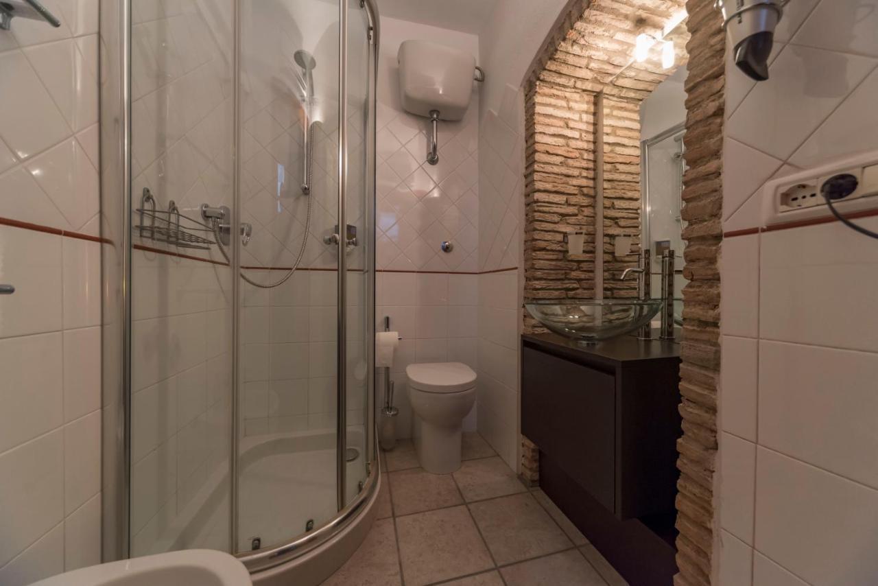Relais Del Porto Hotel กาญารี ภายนอก รูปภาพ