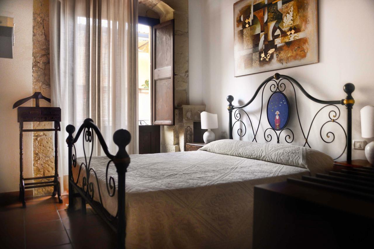 Relais Del Porto Hotel กาญารี ภายนอก รูปภาพ