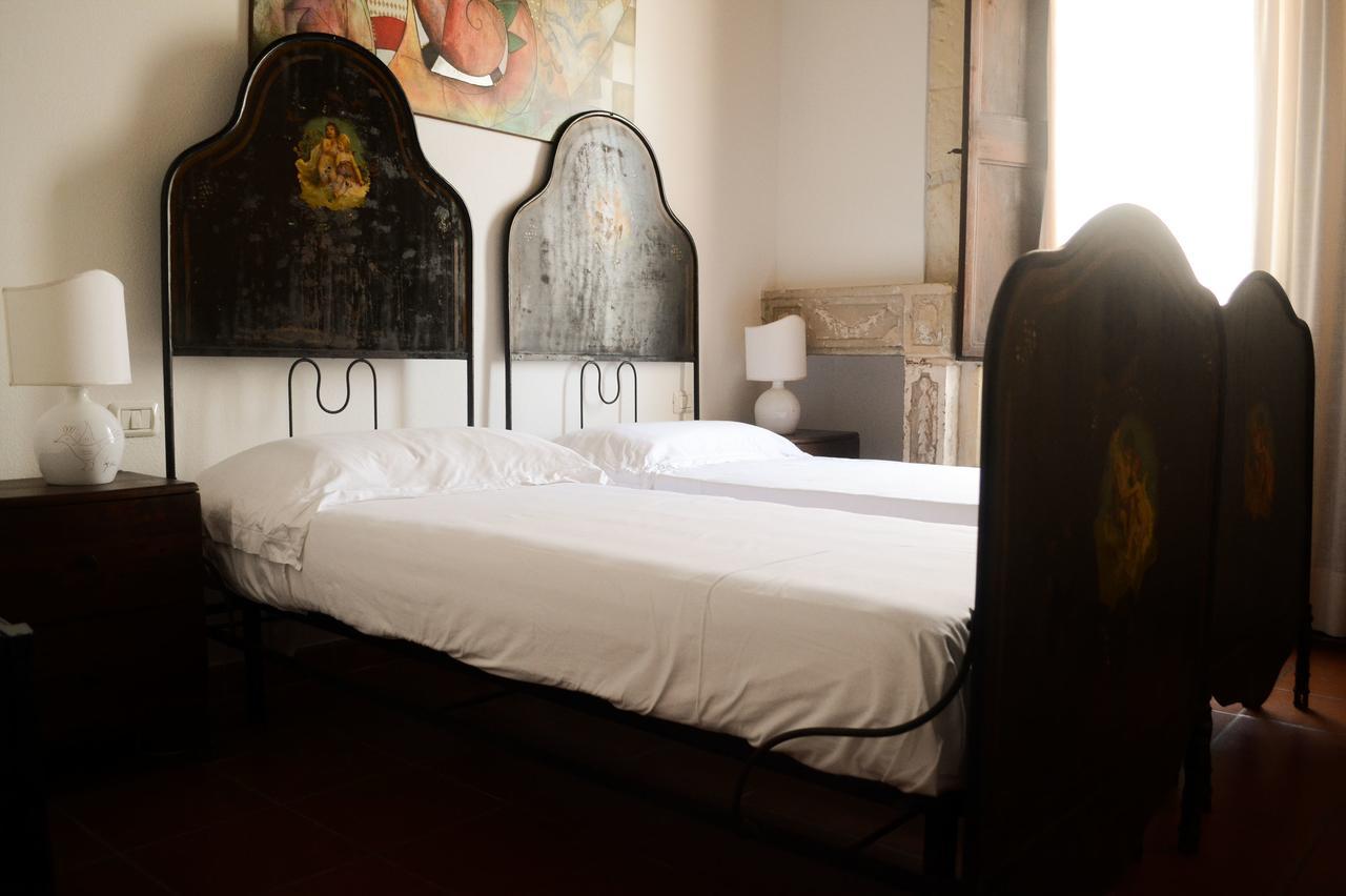 Relais Del Porto Hotel กาญารี ภายนอก รูปภาพ