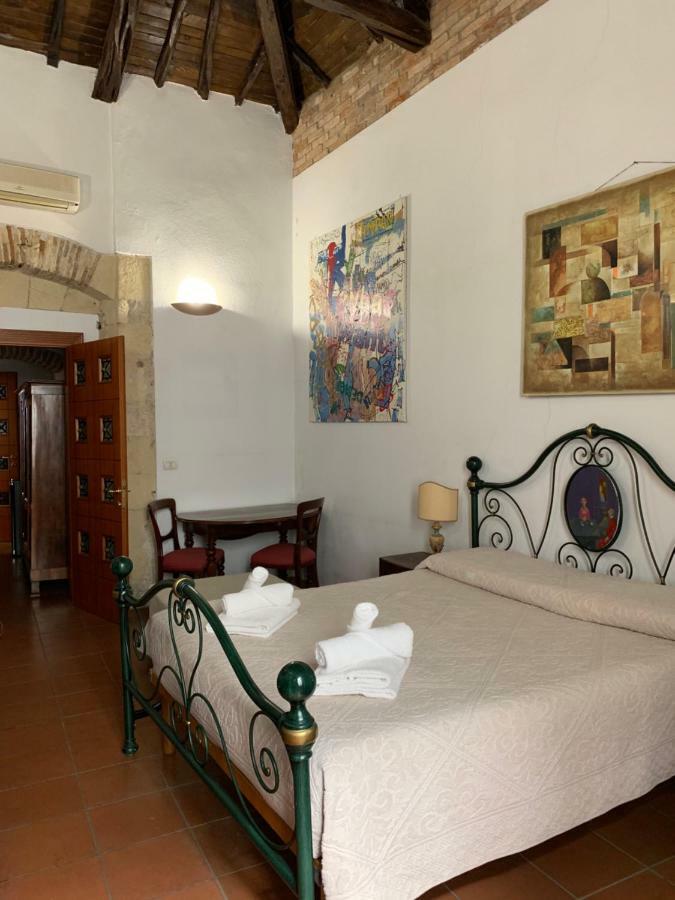 Relais Del Porto Hotel กาญารี ภายนอก รูปภาพ