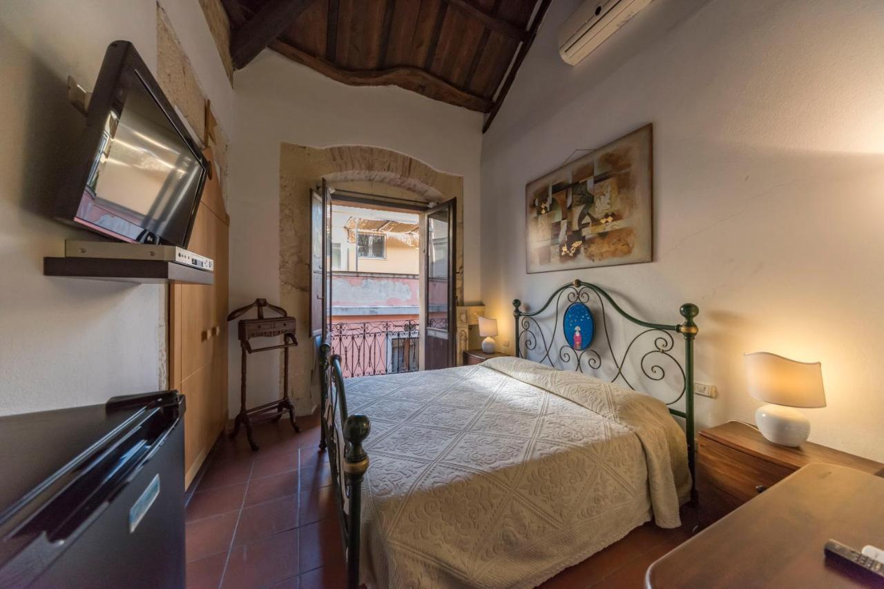 Relais Del Porto Hotel กาญารี ภายนอก รูปภาพ